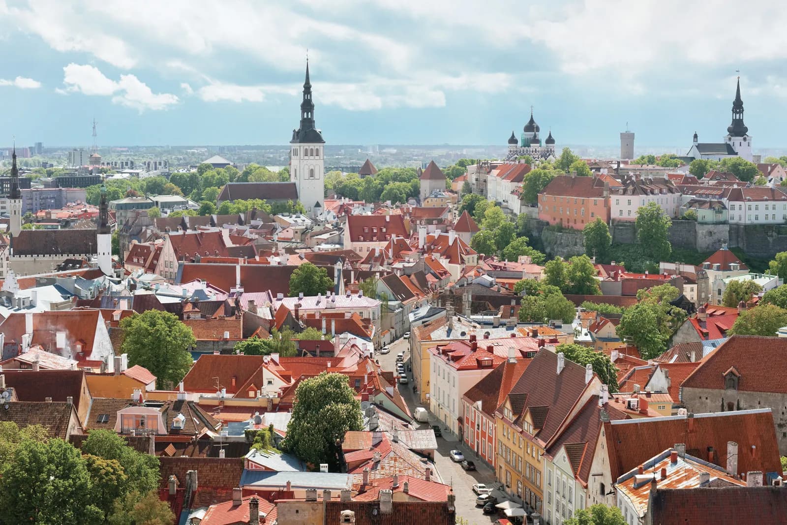 Rooftops of Tallinn's Old Town, with St. Olaf's Church spire and Toompea hill